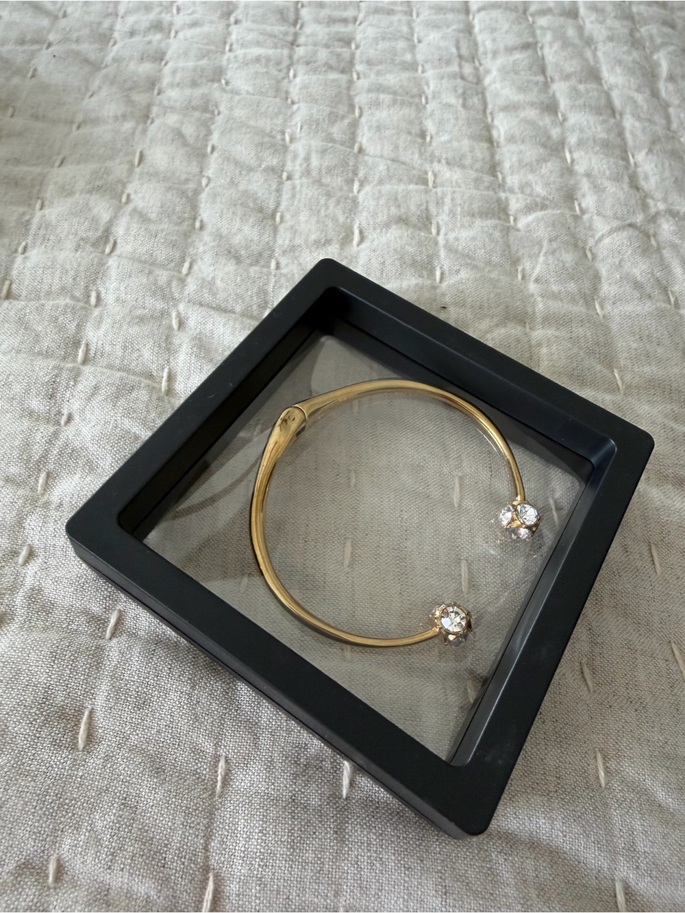 Kate Spade Goldtone Lady Marmalade hinge bracelet with crystal accents